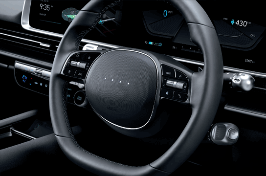 Leather-upholstered steering wheel
