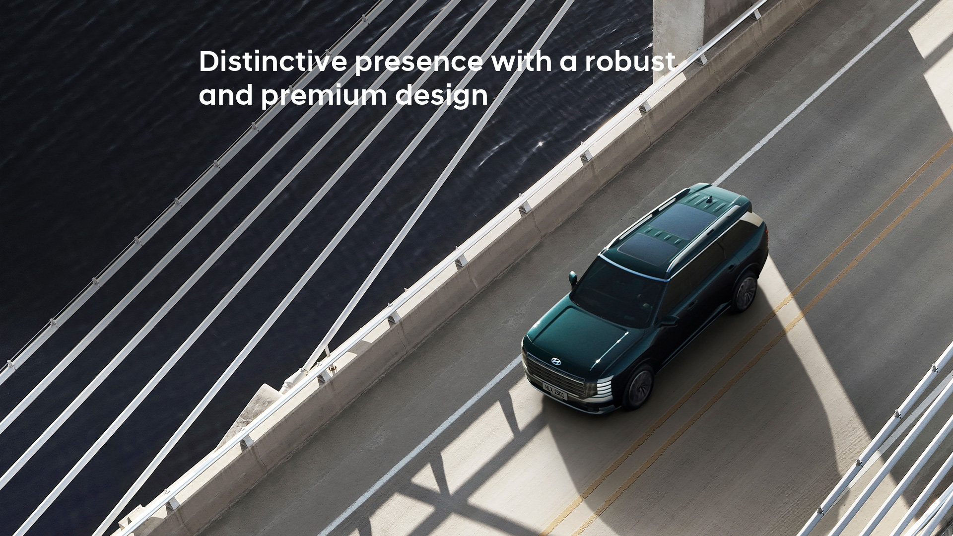 Bird's eye view of the all-new PALISADE, driving on the road