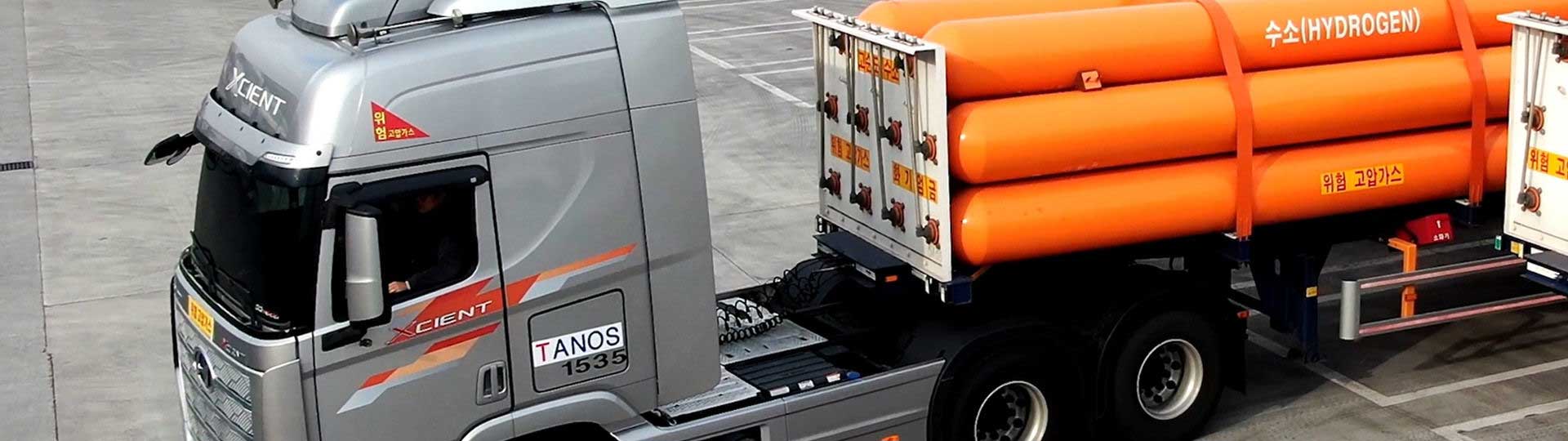 Hydrogen transportation truck is starting moving to hydrogen fueling station.