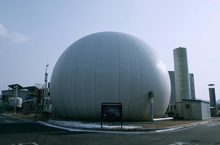 Biogas production facility is seen in the middle.