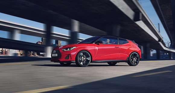 Top view of red veloster with open the door