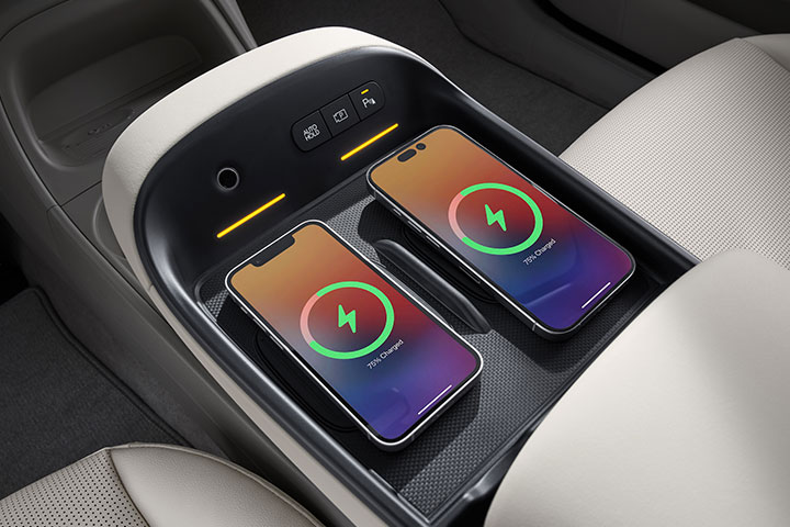 Two mobile devices are charging rapidly without cables.