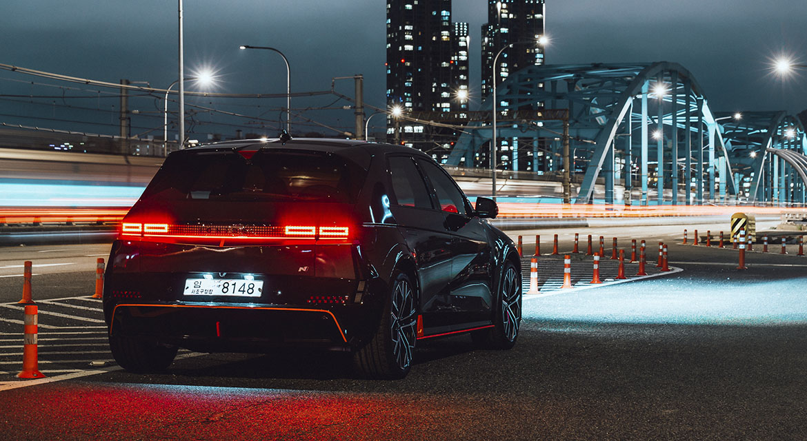 At night, Seoul's illuminated bridges shine like rungs across the inky black ribbon of the river