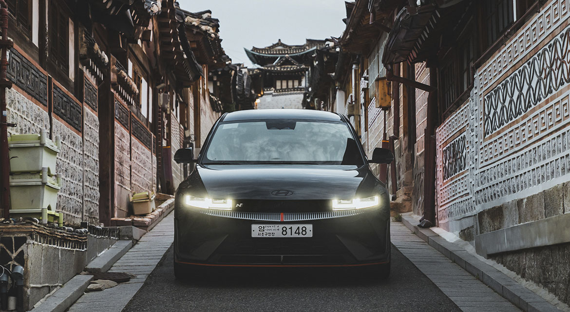 Stunning views from the narrow, steep streets of Seoul's Bukchon hanok village frame the modernity of the city