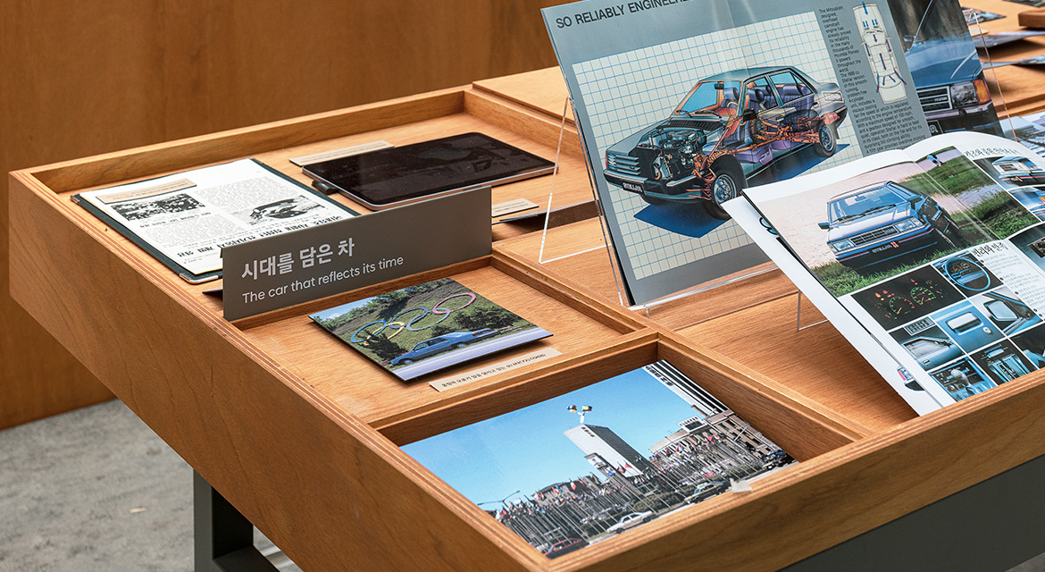 Look closely at the bottom-right image and you’ll spot, from left to right, an EXCEL, STELLAR, and PONY — three era-defining cars that transformed Hyundai’s trajectory