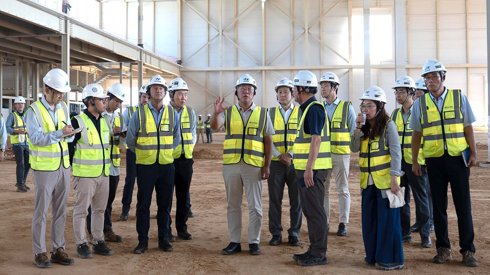 Executive Chair Euisun Chung and José Muñoz, President and CEO of Hyundai Motor Company, are briefed by HMMME Head Wonkyn Park on the progress of the new plant in Saudi Arabia
