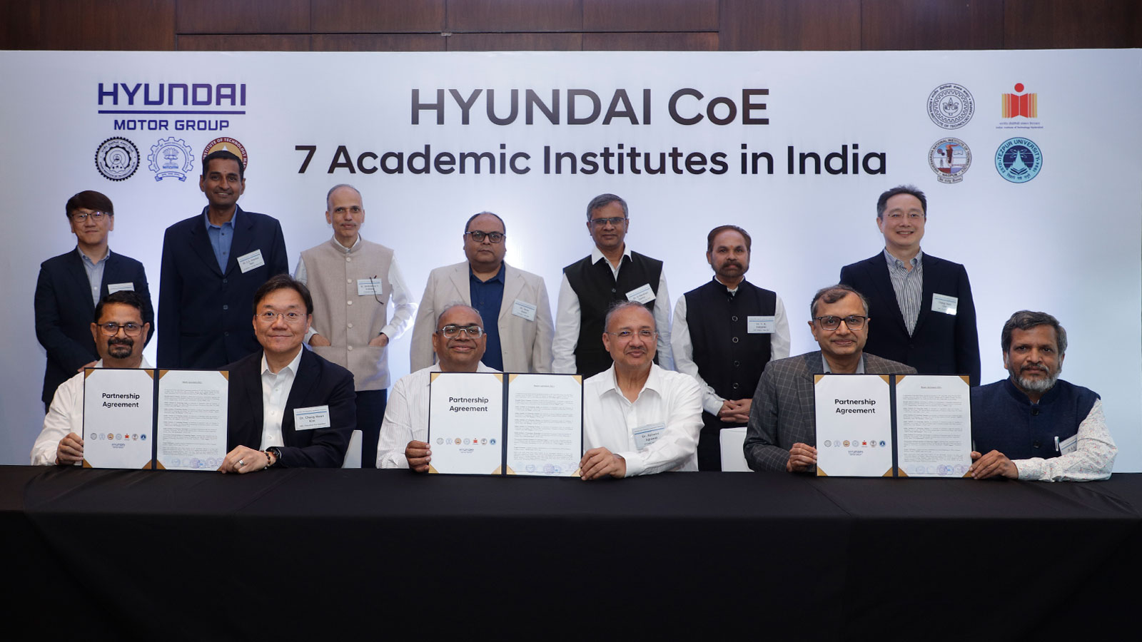 (from left down) Prof. Amarendra Kumar Das, Pro Vice Chancellor of Tezpur; Chang Hwan Kim, Head of the Electrification Energy Solutions Tech Unit and Hyundai CoE Co-Chair; Sudhendu Jyoti Sinha, Advisor of Hyundai CoE; Prof. Ashwini K Agrawal, Dean of IIT Delhi; Tarun Garg, Managing Director of Hyundai Motor India Limited; Prof. Bijaya Ketan Panigrahi, Dean of IIT Delhi and Hyundai CoE Co-Chair  (from left above) Eul Kyo Lim, Head of R&D Planning & Coordination Center; Prof. Coimbatore Subramanian Shankar Ram, Associate Dean of IIT Madras; Prof. Shrikrishna Vyankatesh Kulkarni, Dean of IIT Bombay; Prof. Tarun Gupta, Dean of IIT Kanpur; Prof. Garikapati Narahari Sastry, Dean of IIT Hyderabad; Prof. Yashwant Bhaskar Katpatal, Dean of VNIT, Nagpur; Chang Yeon Cho, Head of Hyundai Motor India Engineering Center