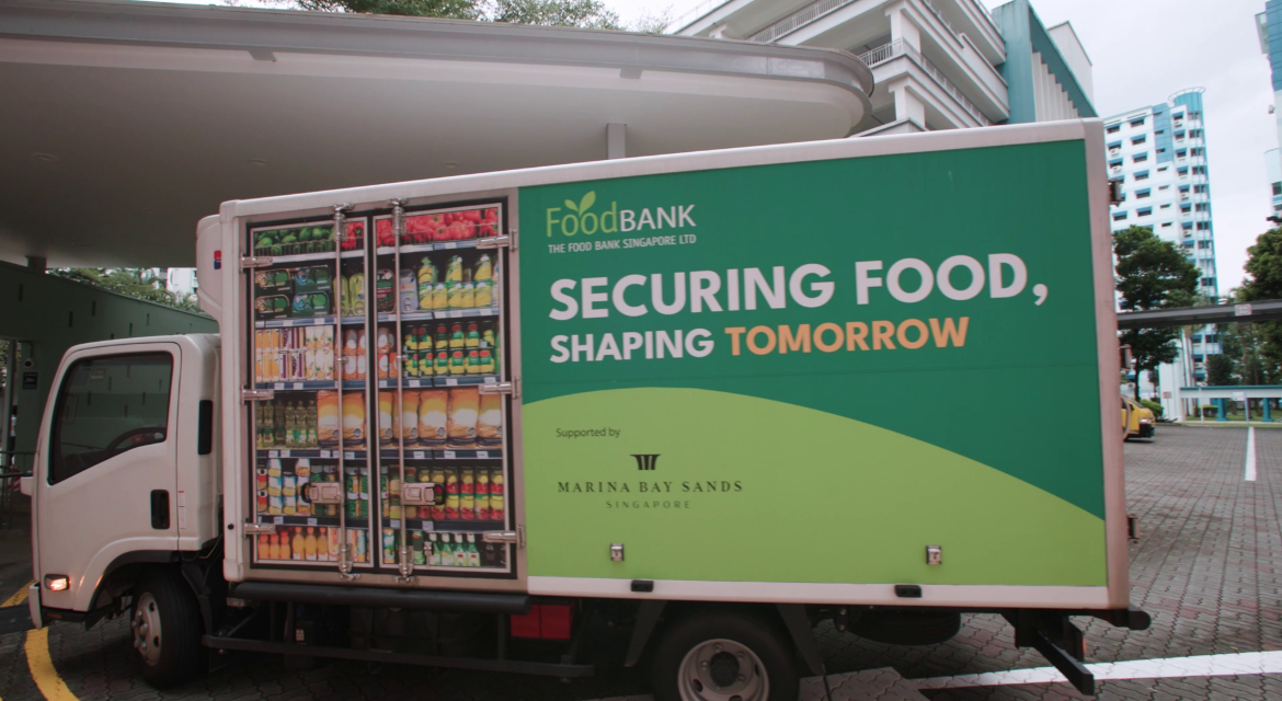 “Each week, a refrigerated food truck arrives at HMGICS to collect the vegetables and transport them to a Thye Hua Kwan Moral Charities (THKMC) distribution center.”
