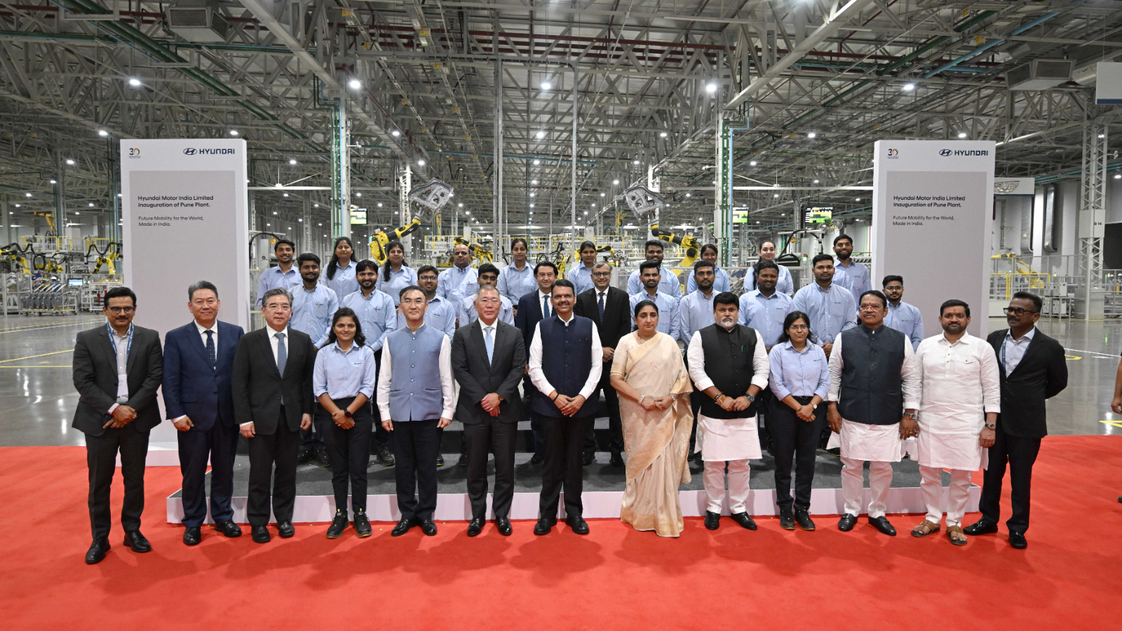 Hyundai Motor India Limited's Pune plant was inaugurated on October 14, 2026. Euisun Chung, Executive Chair, Hyundai Motor Group (6th from L, first row);  Shri. Devendra Fadnavis, Hon’ble Chief Minister of Maharashtra (7th from L); Seong-ho Lee, Ambassador of the Republic of Korea to India (5th from L); Jaehoon Chang, Vice Chair, Hyundai Motor Group (3rd from L) and other guests pose for a group photo. 